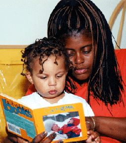 adult reading to a child